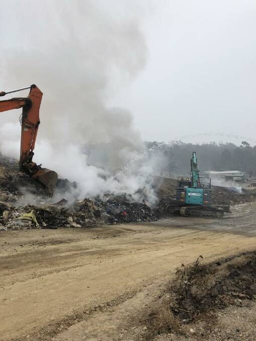 Fires within the Surf Beach Waste Management Facility reignited over the weekend; fire within the waste burns underground, requiring the waste to be dug out, extinguished, re-compacted and covered. Image: Eurobodalla Shire Council