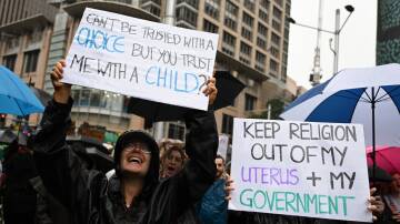Thousands took the streets in capital cities demanding free abortions and more accessibility to health services for women and pregnant people. Picture: AAP