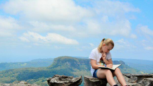 Sarah sketches atop Drawing Room Rocks. Photo: Tim the Yowie Man

