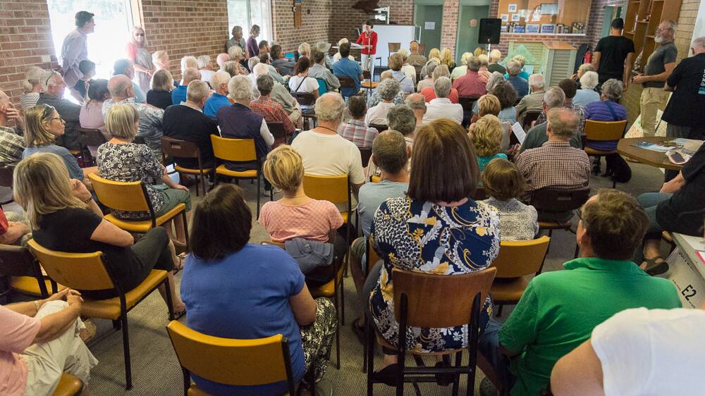 PACKED OUT: More than 100 people attended a meeting opposing the council's Rural Lands Strategy at Captain Oldrey Park Hall in Broulee on Sunday.