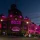 Melbourne lit up famous landmarks in pink in memory of cancer fighter Olivia Newton-John. (Diego Fedele/AAP PHOTOS)