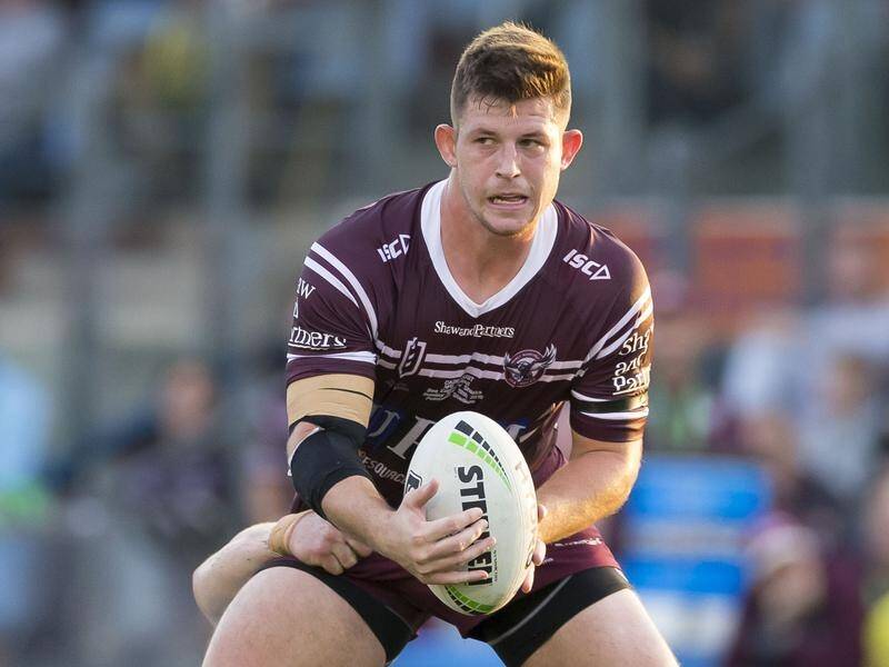 Cade Cust produced an impressive debut display to steer Manly to a 24-14 upset win over Cronulla.