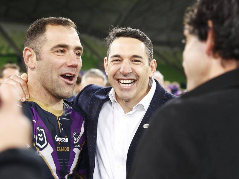 Ex-Melbourne and Maroons star Billy Slater (c) has officially been named coach of the Qld team.