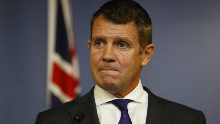 NSW Premier Mike Baird announces his retirement at a press conference on Thursday. Photo: Janie Barrett