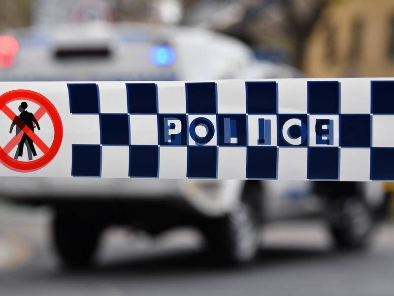 A man has been arrested six months after allegedly spraying a Sydney house with bullets.