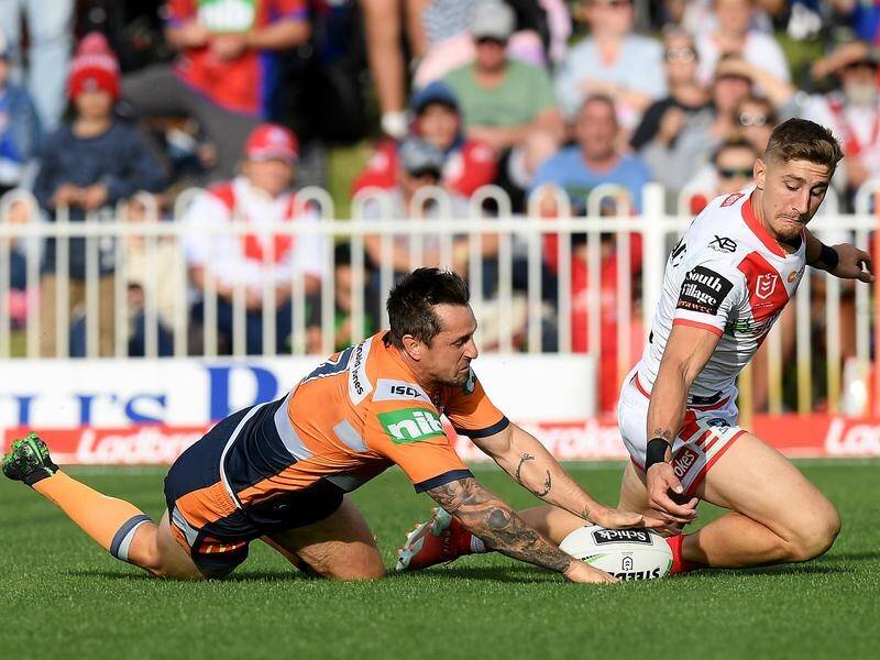Mitchell Pearce scored one of Newcastle's seven tries in the 45-12 win over St George Illawarra.