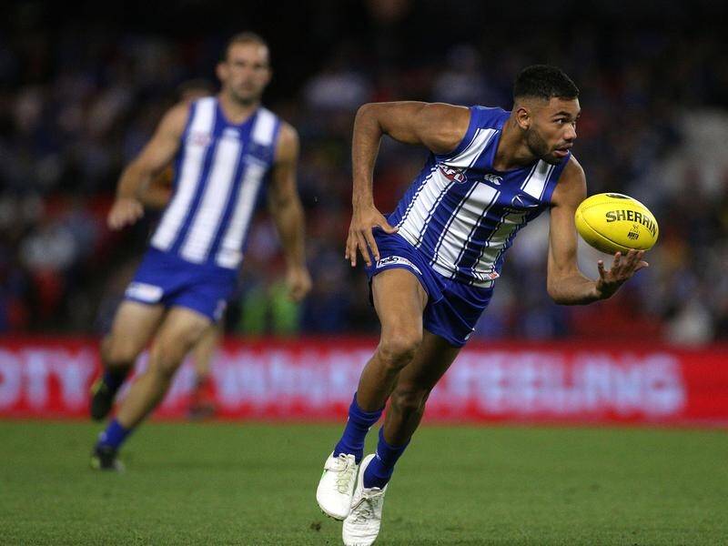 Tarryn Thomas has beaten a rough conduct charge out of North Melbourne's AFL win over Hawthorn.