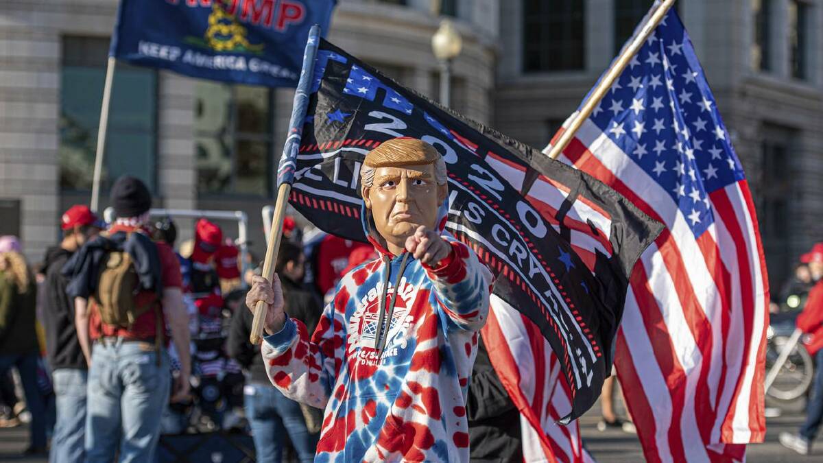 Foreign accounts parroting US patriotism are probably driven by profit not politics, an expert says. (AP PHOTO) Foreign accounts parroting US patriotism are probably driven by profit not politics, an expert says. (AP PHOTO)
