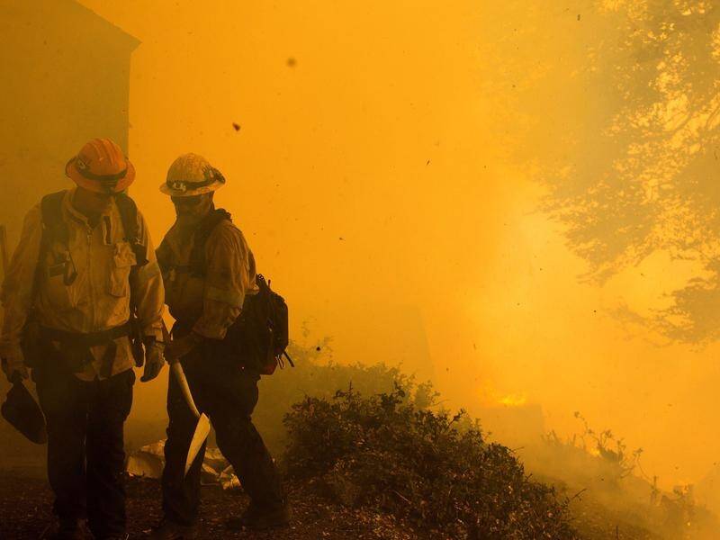 Scientists and officials describe the western US's wildfires as unprecedented in scope and ferocity.