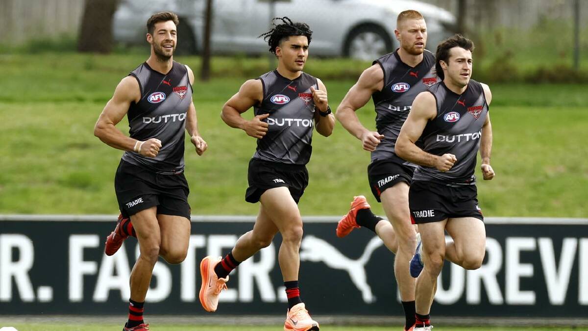Andrew McGrath, tipped to take over the captaincy, leads the way at Essendon training. (Con Chronis/AAP PHOTOS)