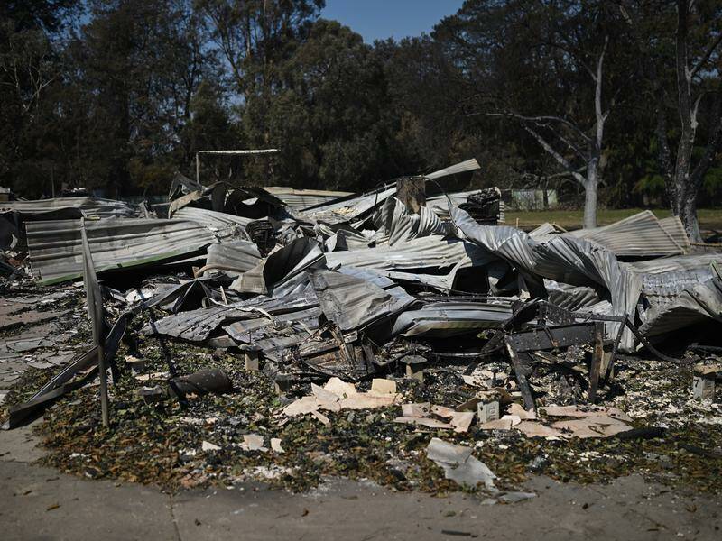 Recovery and rebuilding are coming into focus with easing conditions helping firefighters. Photo: James Ross/AAP PHOTOS