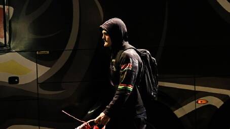 An injured Nathan Cleary boards the team bus at the end of their game with Canterbury. (Mark Evans/AAP PHOTOS)