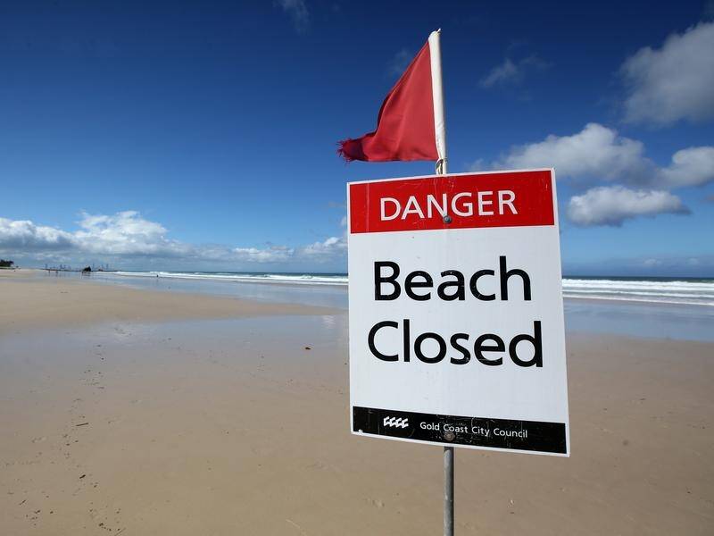 A man has been taken to hospital after being bitten by a shark off the central Queensland coast. (Jono Searle/AAP PHOTOS)