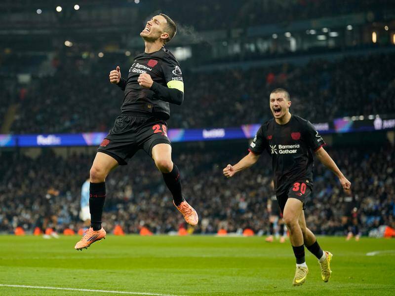 Leverkusen's Alejandro Grimaldo was jumping for joy after scoring against Manchester City. Photo: AP PHOTO