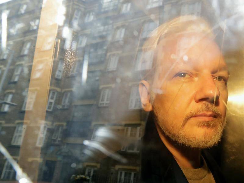 Julian Assange appeared at Westminster Magistrates' Court by video-link on Friday.