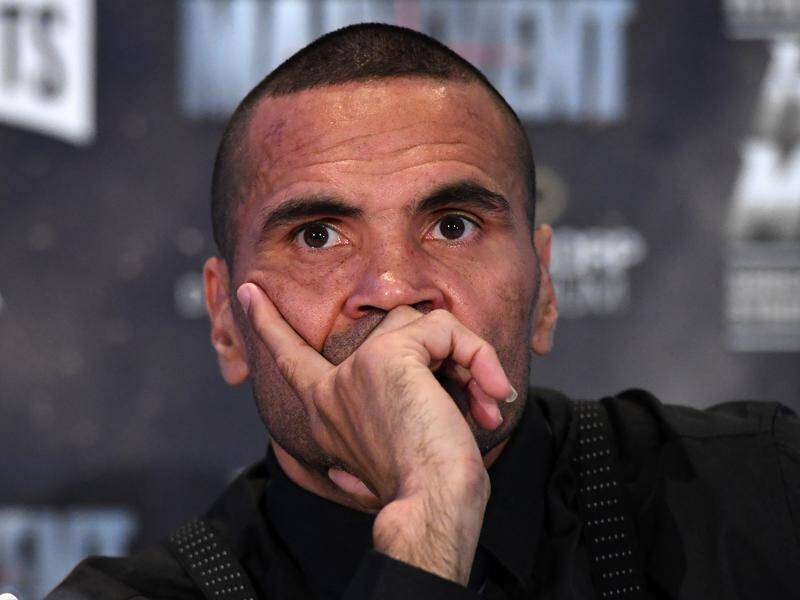 Anthony Mundine won't stand for the national anthem if it's played before his fight with Jeff Horn.