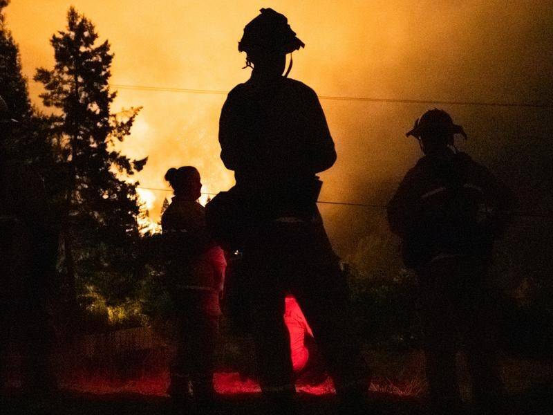At least seven people have died in the California wildfires and four are reported missing.