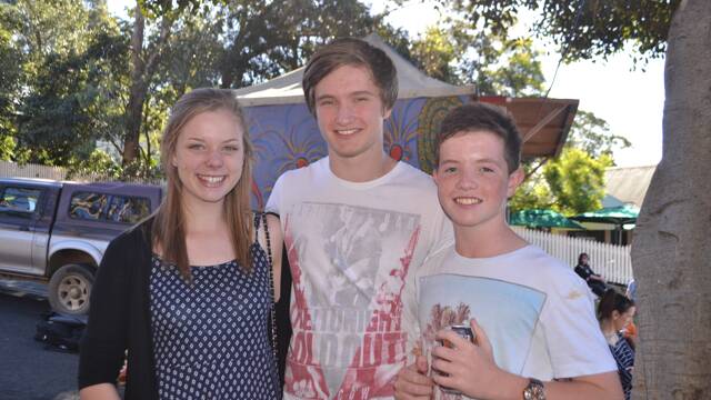 TILBA KIDS: Ashleigh Avill with Max and Nick Carter at the Tilba Festival on Easter Saturday.