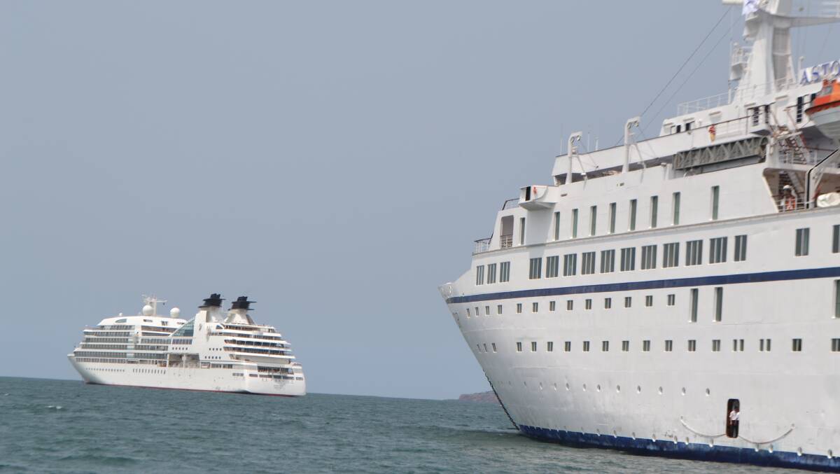 TWO SHIPS: The MV Astor and Seabourn Sojourn at anchor in Twofold Bay at Eden, NSW.
