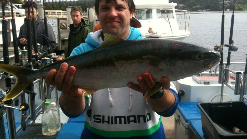 NAROOMA CHARTERS: Chris Dass with his king caught on Sunday with Narooma Charters.