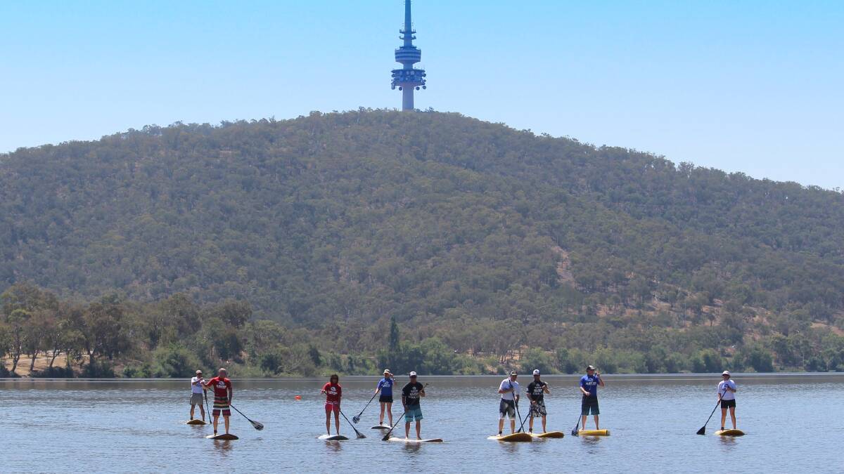 LAKE SESSION: Stand-up paddleboarding on Lake Burley Griffin with a group of Canberra politicians. 