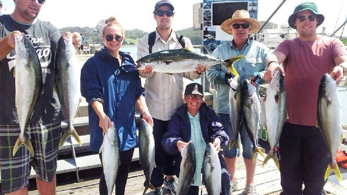 PLAYSTATION KINGS: Ryan, Nat, Angus, Margaret and Chris Cambel from Cooma with 11 legal kingies and a nice feed of reef fish caught on the Playstation on Sunday. 
