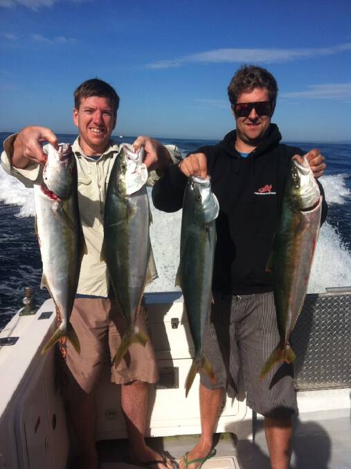 BOYS’ KINGS: Travis Nation and Nick Stray with their kingfish on Thursday morning on Nitro operated by Benny and Nick from Charter Fish Narooma. 