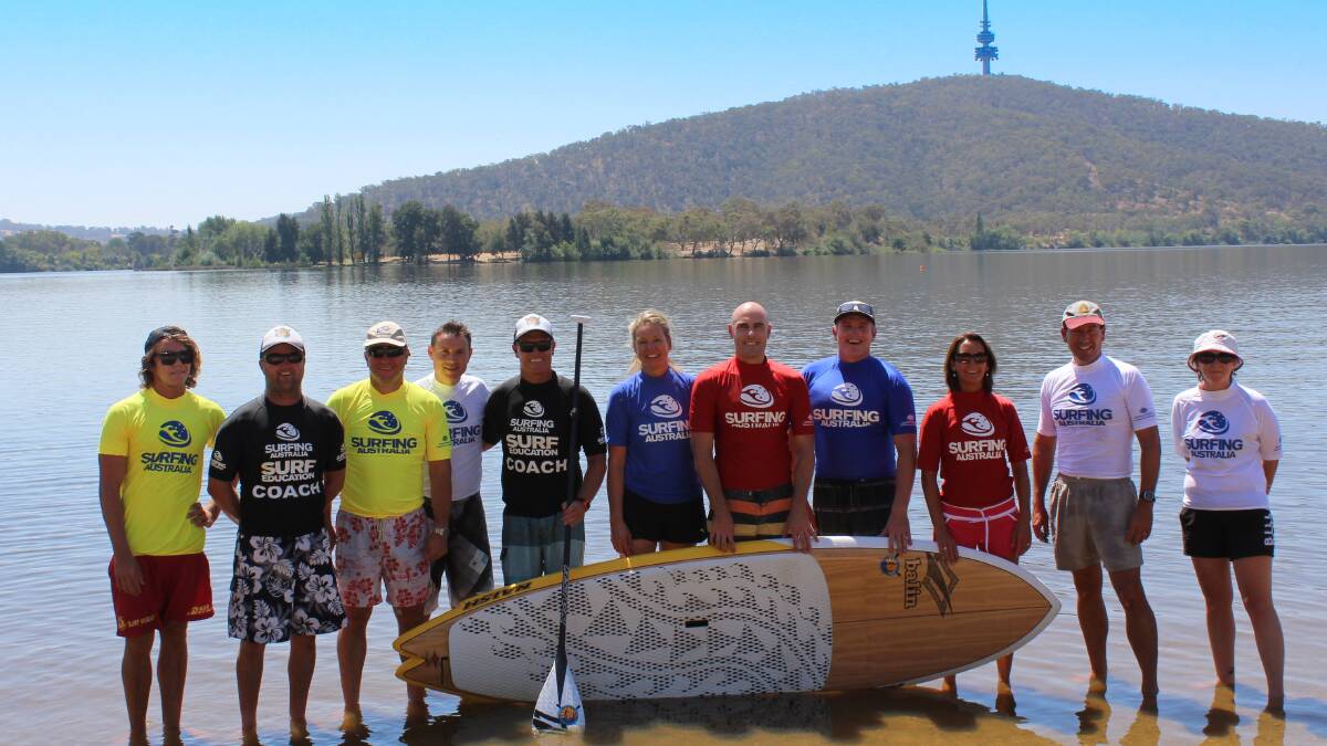 BOARD FOR CAUSE: The group of politicians had a great time learning how to stand-up paddleboard. 