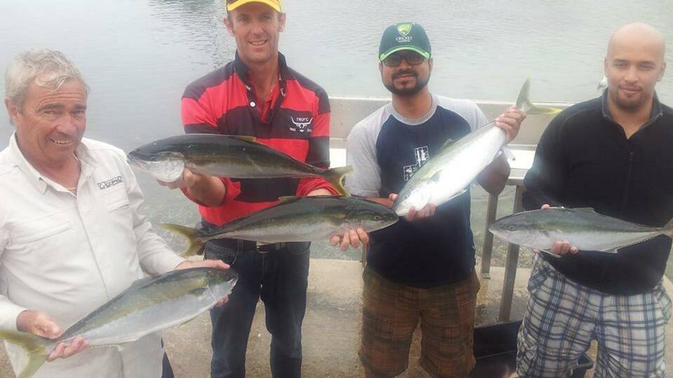 MORE KINGS: These Canberra crew were happy with their catch on Charter Fish Narooma boat Playstation on Saturday.
