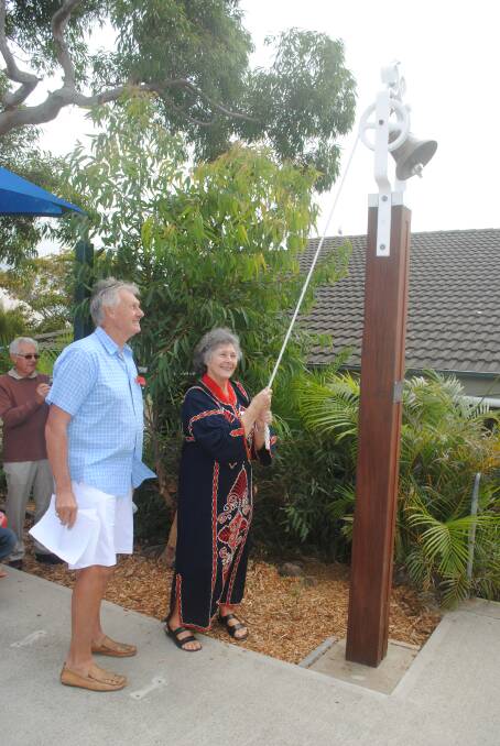 BELL: The first person to ring the newly restored original school bell was Beatrice Bourn nee Stepanovic watched by compere Geoff Lanham.