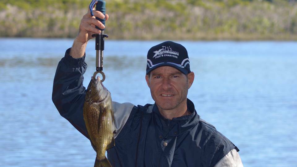 SOUTH COAST BREAM: Steve Dolan with a nice bream caught on a lake south of Bermagui yesterday.