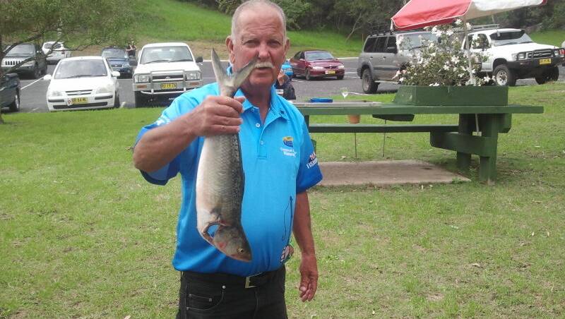 MAX SALMON Max Favel and his salmon weighed in at the Narooma Bolwo fishing club weigh-in. 