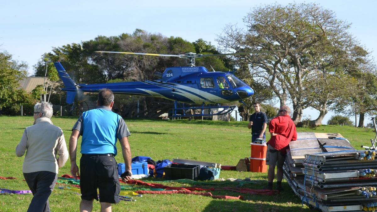 Photos of the first airlift of material from Mystery Bay to Montague Island...