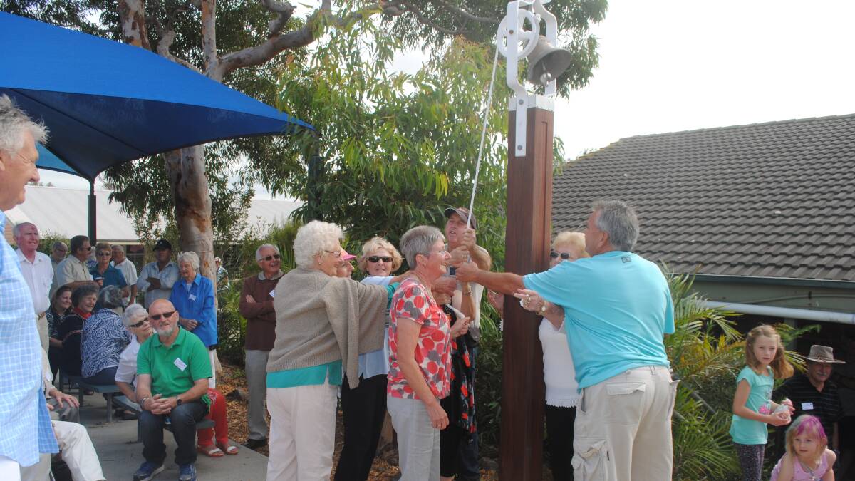 RING: The Narooma Public School 125th Anniversary Committee all ring the bell.