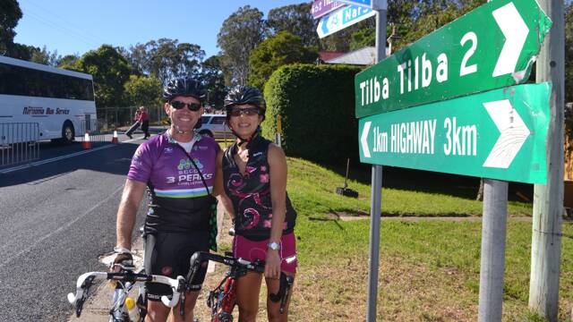 BIKE RIDERS: Cyclists Peter Victory from Adelaide and Kathy Ng from Melbourne are on a cycling holiday and cycled to the Tilba Festival on Easter Saturday from Wallaga Lake.