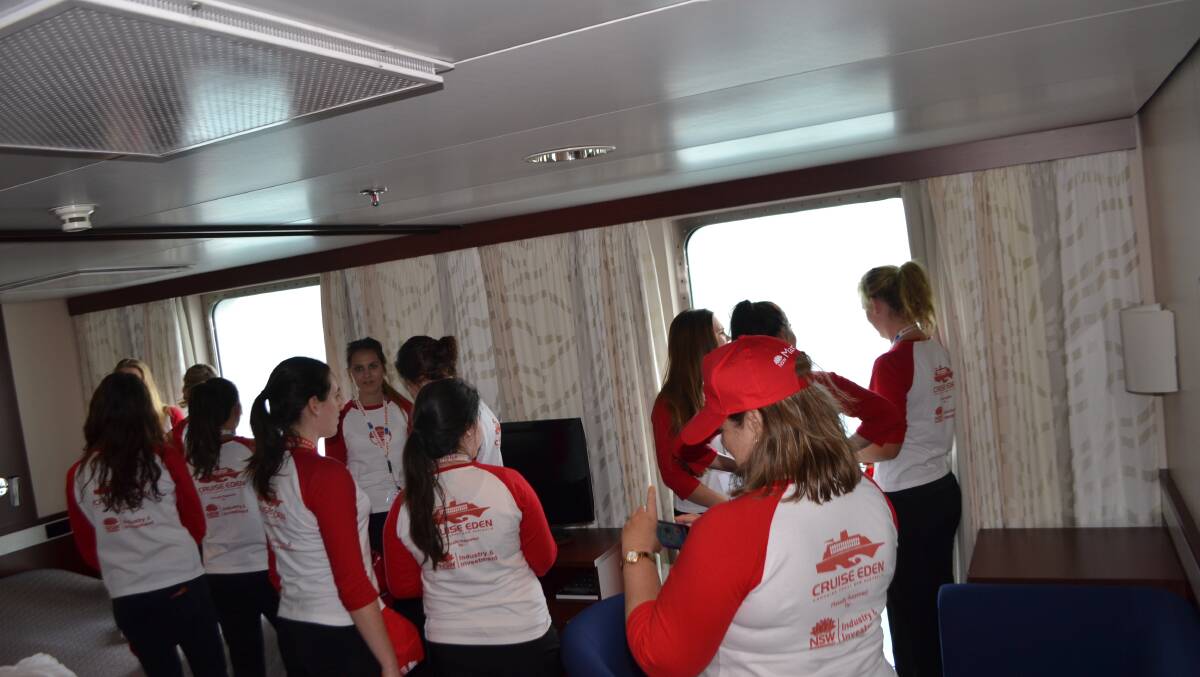 LEARNING THE ROPES: The cruise ship MV Astor’s customer service manager Chris White gave the Bega TAFE Tourism students a tour of his ship. 