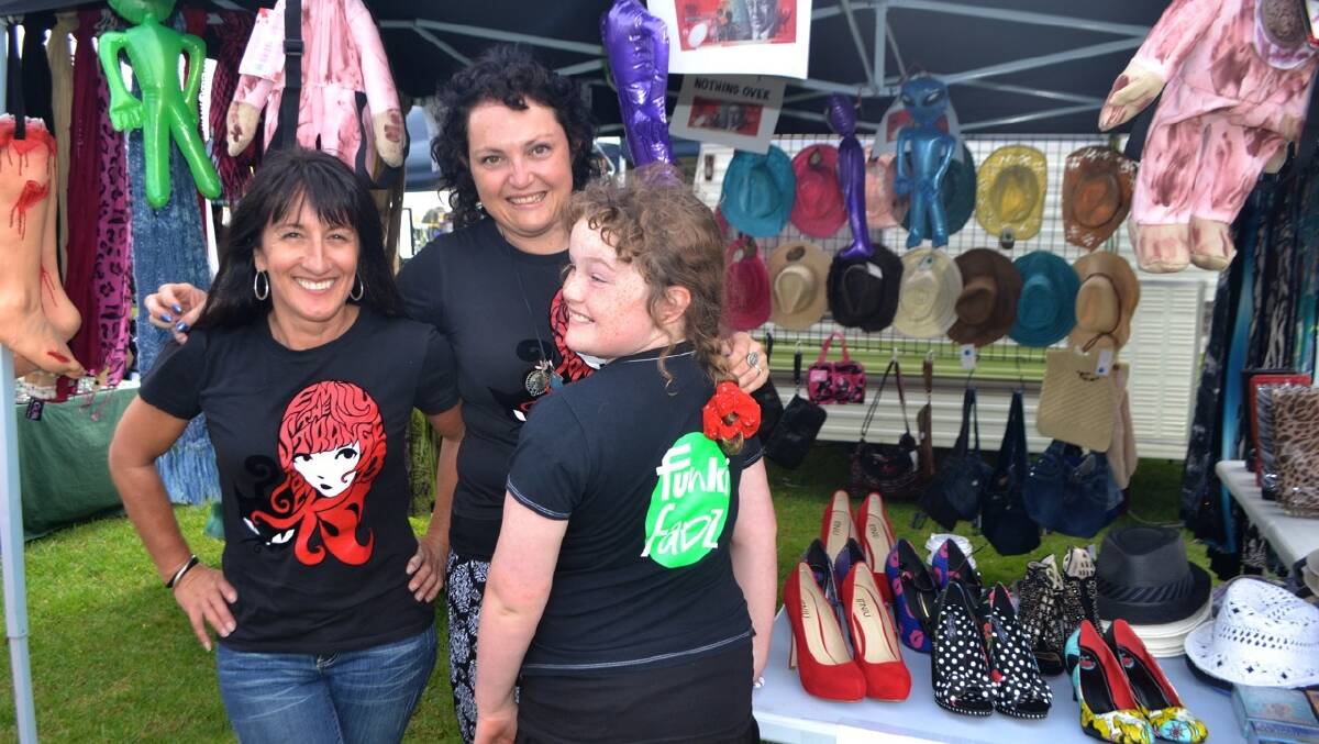 FUNKIFADZ: Heading down again to the Bermagui Bike Show is Fran Held of Funkifadz clothing in Narooma pictured with Michelle and Ashley Morrison. Everything was under $20! 