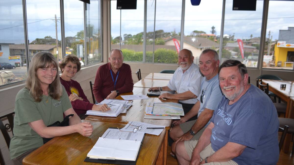 TOUR PLANNING: Tour leaders, including renowned lighthouse author John Ibbotson, met at JJ’s restaurant at the Top of Town Motel to plan their next trip. Also pictured are Judy and Bill Newblom, Skip and Mary Lee Sherwood from the US and Aussie Chris Holt. 