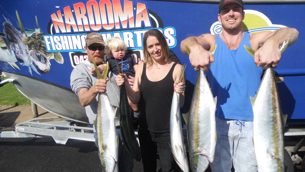 NAROOOMA CHARTER: Enjoying a family day of fishing with Narooma Fishing Charters, Travis and Finnegan Mays from Lakes Entrance, and Sarah and Michael Moore from Sydney. 