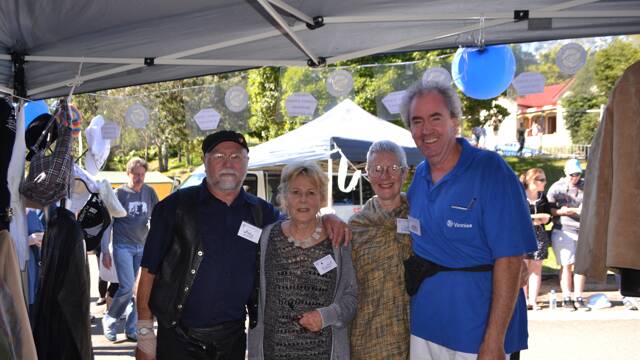 VINNIES CREW: Doing a hot trade at the St Vincent’s de Paul Narooma stand are John Hunter, Wilma Dunn, Carole Evans and John Worldon at the Tilba Festival on Easter Saturday.