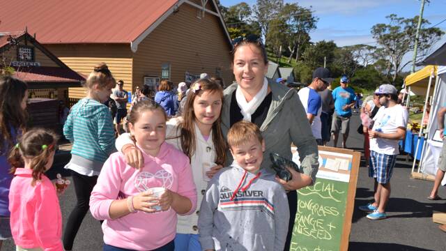 LOCAL FAMILY: Abbey, Sammy and Riley with mum Glennie Dawson at the Tilba Festival on Easter Saturday.