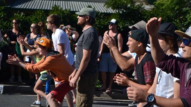 EGG TOSSERS: The egg toss is always a big hit at the Tilba Festival with catchers and throwers doing their best on Bate Street.