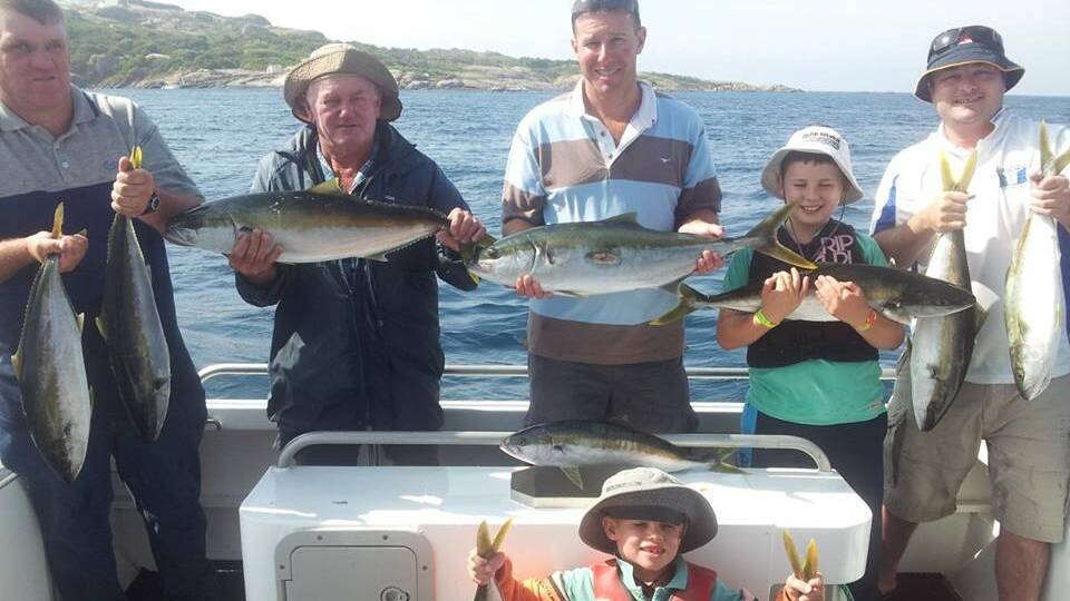 GOOD DAY: Nathan and Archie Stoll, Ben and Fergus Howard from Wagga managed 10 legal kingfish (between 6 and 7kg) on the Playsation on Thursday at Montague Island where the water colour and temp had improved - mostly taken on jigs.
 
 