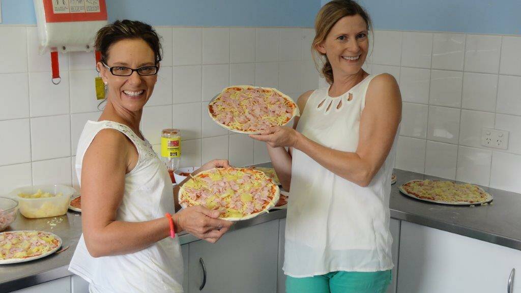 PIZZA TIME: Jess Loudoun and Kate Jackson making pizza!