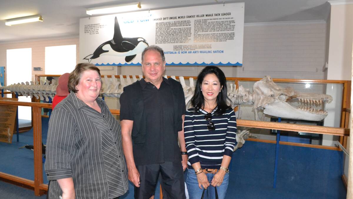 WITH OLD TOM: Seabourn Sojourn passengers Mitch and Helen Rosner from Chicago went shopping for their favourite Aussie muesli bars and visited Old Tom at the Eden Killer Whale Museum where they met local Kathleen Vandermay. 