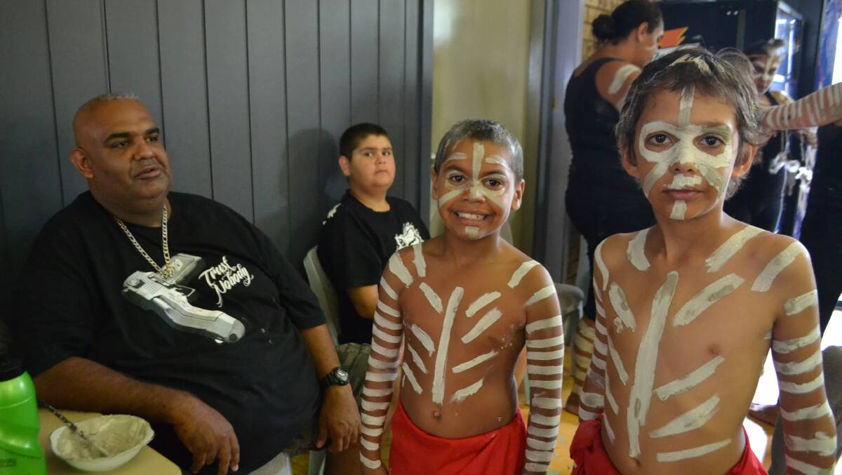 THE DANCERS: The Djaadjawan Dancers from Narooma prepare themselves for the dancing at the Wagonga lands council celebration. 