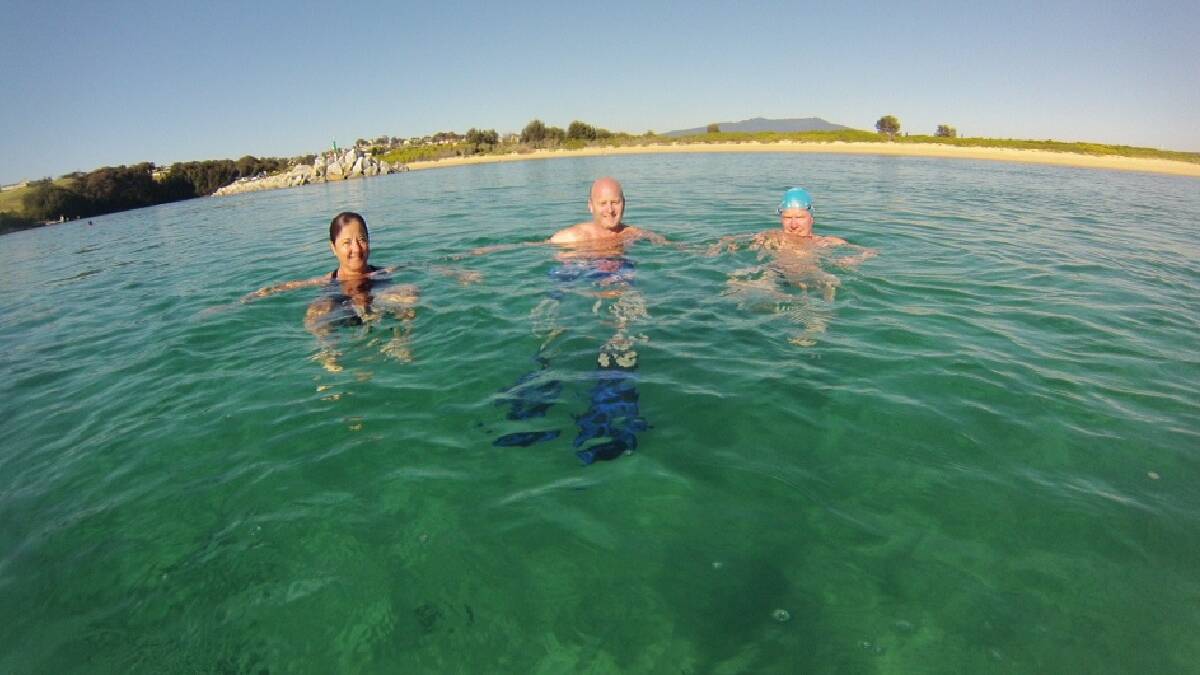 BLUE WATER: Having a dip during one of last year’s Numnutz swims are Dawn Critcher, Scott Cavanagh and Mark “Podge” Rogerson. 