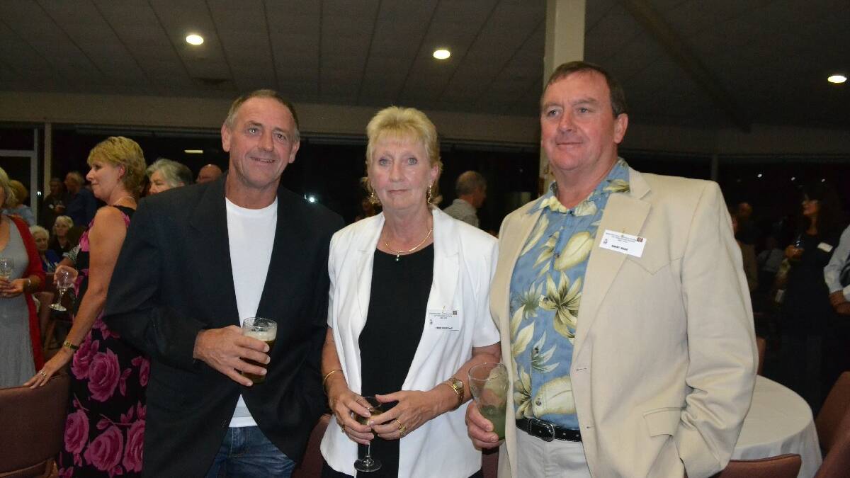REUNION NIGHT: Ray Ross Kelly with Carol and Barry Mead at the Narooma
Public School 125th anniversary cocktail evening.
 