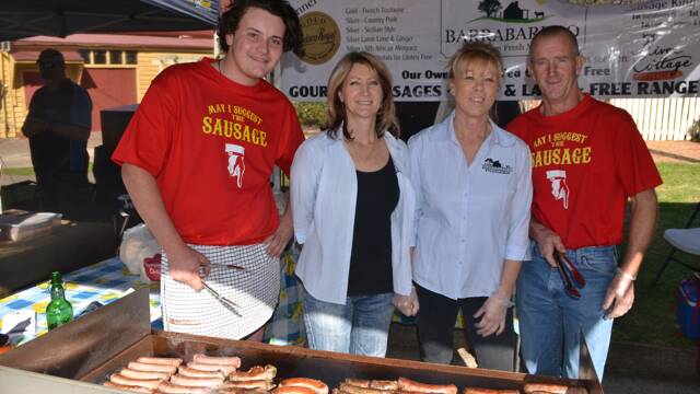 SAUSAGE KINGS: Selling out of snags at the Tilba Festival on Easter Saturday were the Barrabarroo Farm Fresh Meats crew of Andrew McCrohan, Wendy Fisher, Deborah Tracey and Peter “Bubba” Bailey.