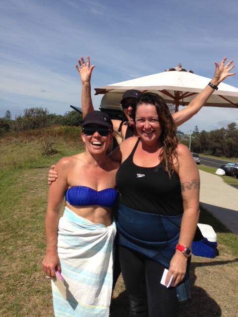 SURFER OF THE MONTH: From left Surf Sista Surfer of the Month Lin Wilton with Sammee McCarthy being photo bombed by Sue Lawson. 